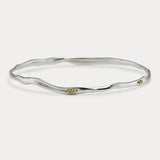 Elegant Sterling Silver Bangle with Brass Pips