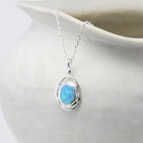 Handmade Spiral Silver Pendant with Blue Fire Opal