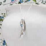 Blue Topaz and Pearl Flowing Pendant and Earrings Set