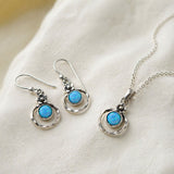 Sterling Silver Blue Fire Opal Earrings and Pendant with Flower Detail Set