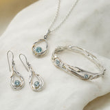 Undulating Sterling Silver and Blue Topaz Necklace, Bangle and Earrings Set