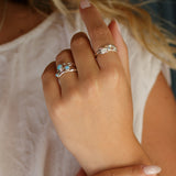 Blue Topaz and White Fire Opal Flower Ring