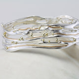 Handcrafted Sterling Silver Bangle with Gold Details