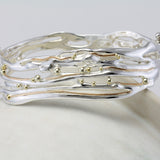 Handcrafted Sterling Silver Bangle with Gold Details