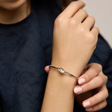 Elegant Sterling Silver Lily Bangle