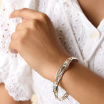 Organic Blue Topaz and Pearl Bracelet on a model's wrist