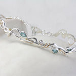 Sterling Silver Bracelet with Blue Topaz and Pearl