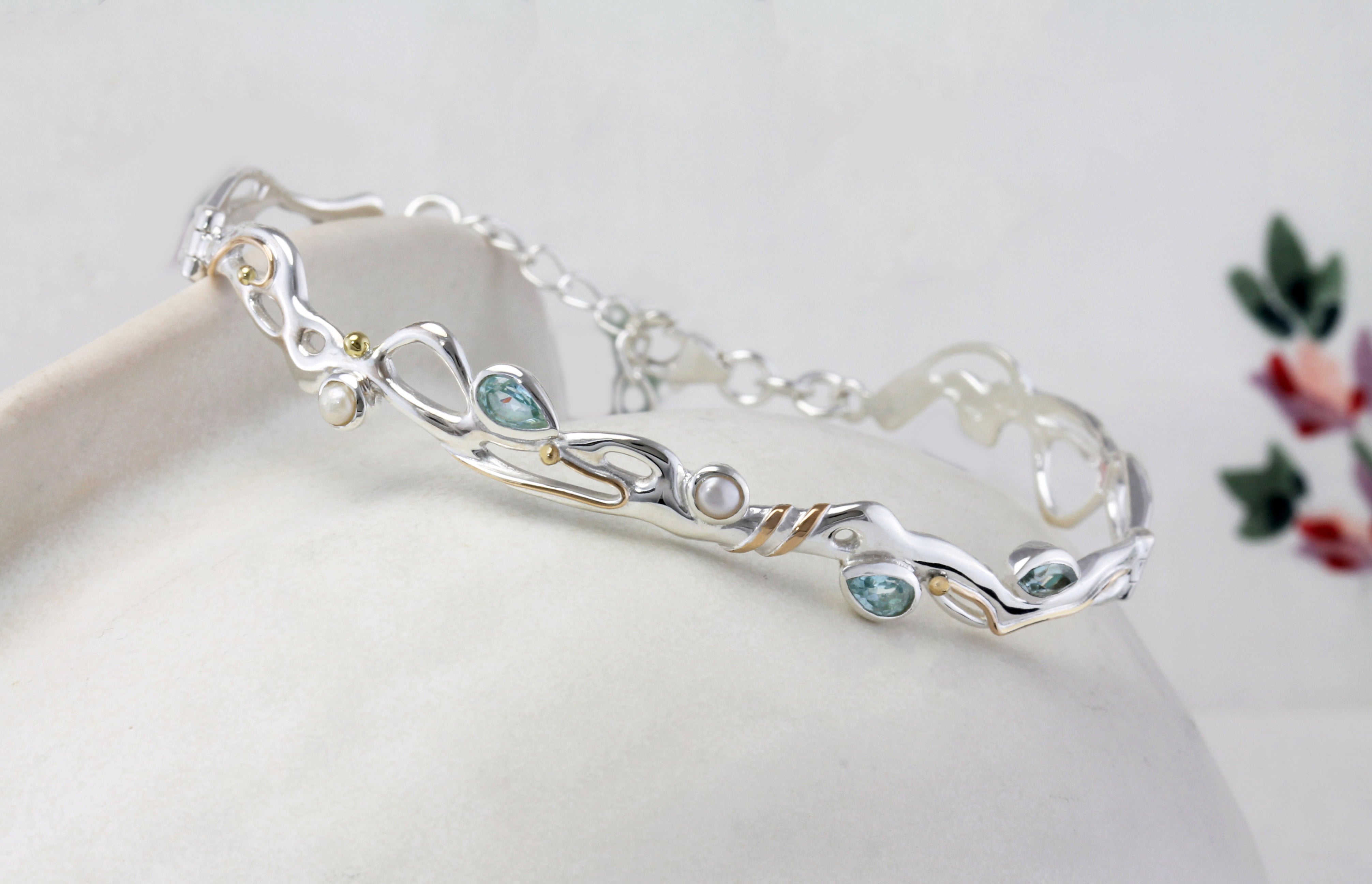Sterling Silver Bracelet with Blue Topaz and Pearl