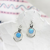 Sterling Silver Blue Fire Opal Earrings with Flower Detail