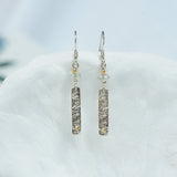 Textured Silver Dangle Earrings with Gold Detailing