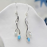 Flowing White and Blue Opal Drop Earrings