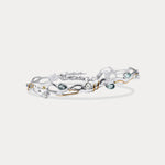 Blue Topaz and Pearl Sterling Silver bracelet on a white background