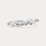 Blue Topaz and Pearl Sterling Silver bracelet on a white background