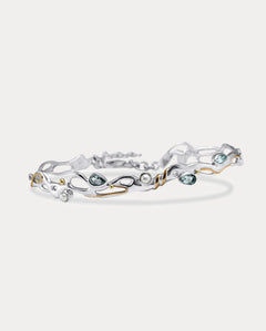 Blue Topaz and Pearl Sterling Silver bracelet on a white background