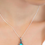 Sterling Silver Blue Fire Opal Pendant with Flower Detail