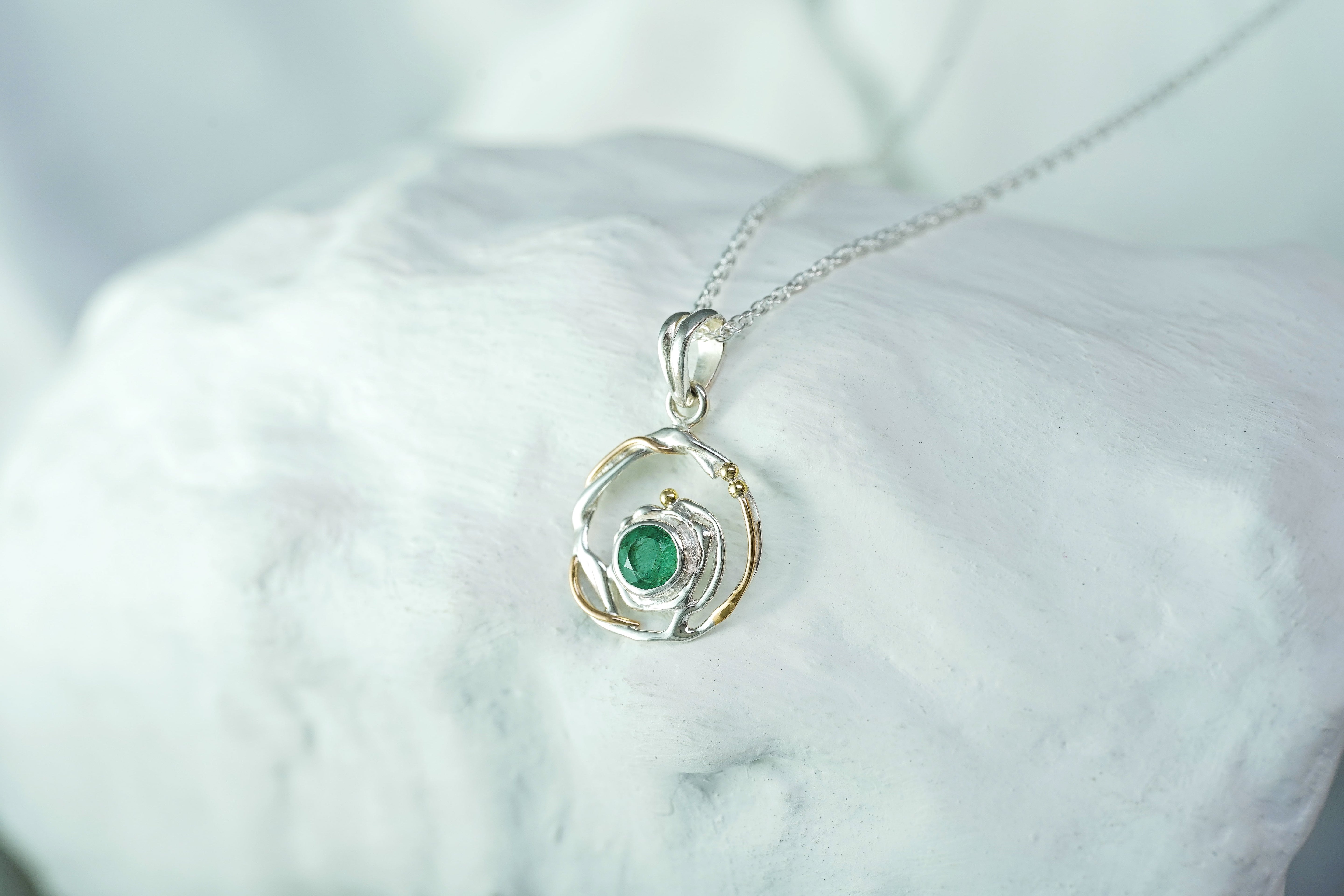 Unique Circular Emerald Silver Pendant