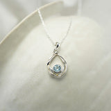 Undulating Sterling Silver and Blue Topaz Necklace