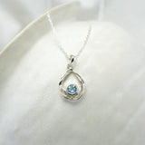 Undulating Sterling Silver and Blue Topaz Necklace, Bangle and Earrings Set