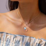 Oval Spiral Blue Opal Pendant