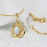 Dainty Moonstone and Lab-grown Diamond Gold Pendant