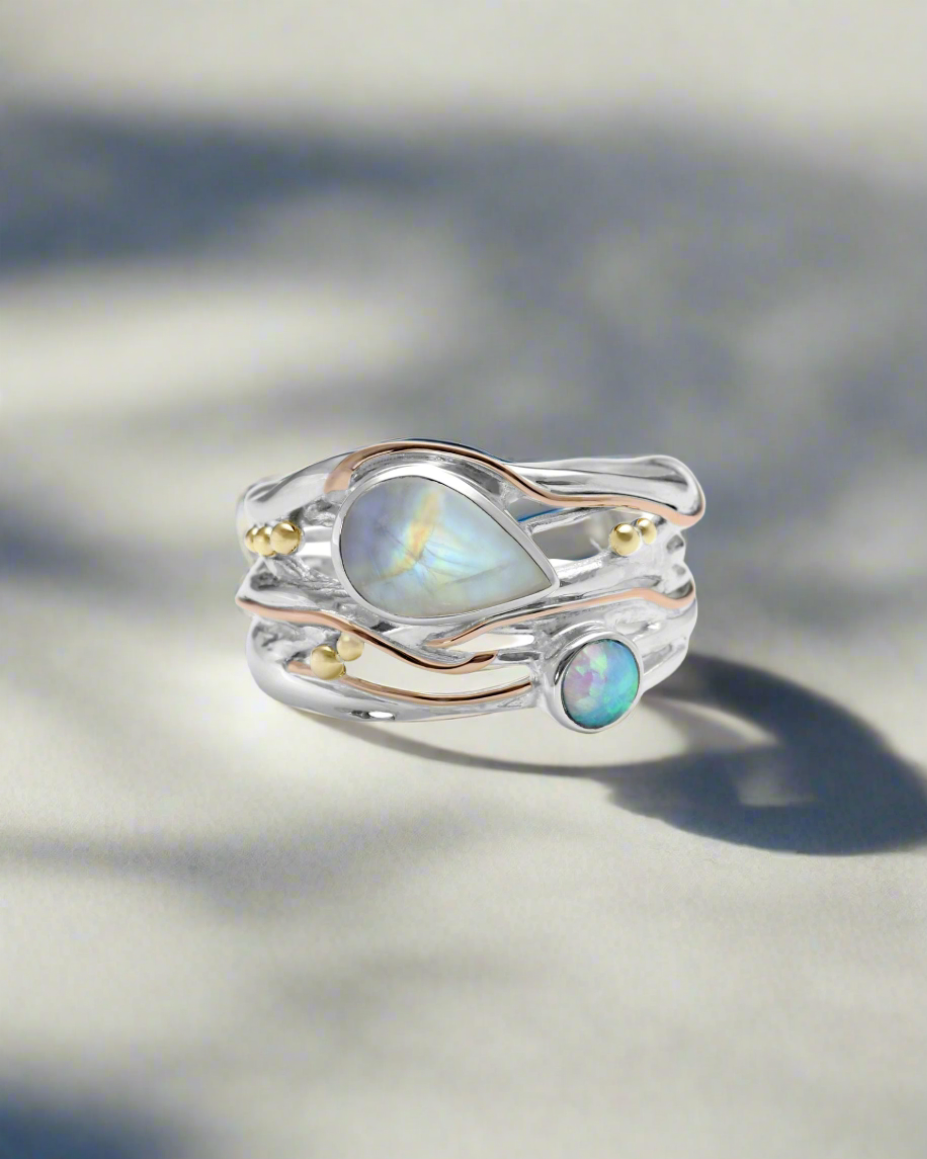 Gemstone ring made from silver and gold