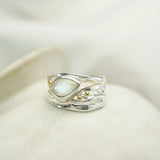 Rainbow Teardrop Moonstone Ring enhanced with 14ct gold detailing.