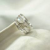 Rainbow Teardrop Moonstone Ring enhanced with 14ct gold detailing.