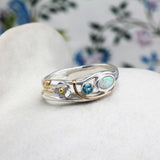 Blue Topaz and White Fire Opal Flower Ring
