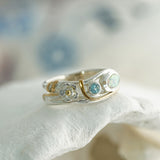 Blue Topaz and White Fire Opal Flower Ring
