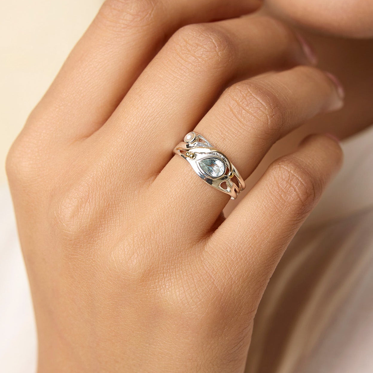 Blue Topaz and Pearl Ring with Gold Detail