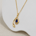 gold sapphire dainty pendant 
