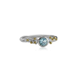 Blue Topaz Ring in Sterling Silver with Brass Details