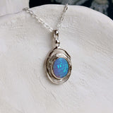 Handmade Oval Spiral Silver Pendant with Blue Fire Opal