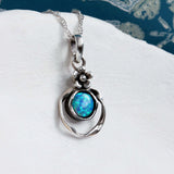 Blue Opal Pendant Framed in Sterling Silver with Flower Detail
